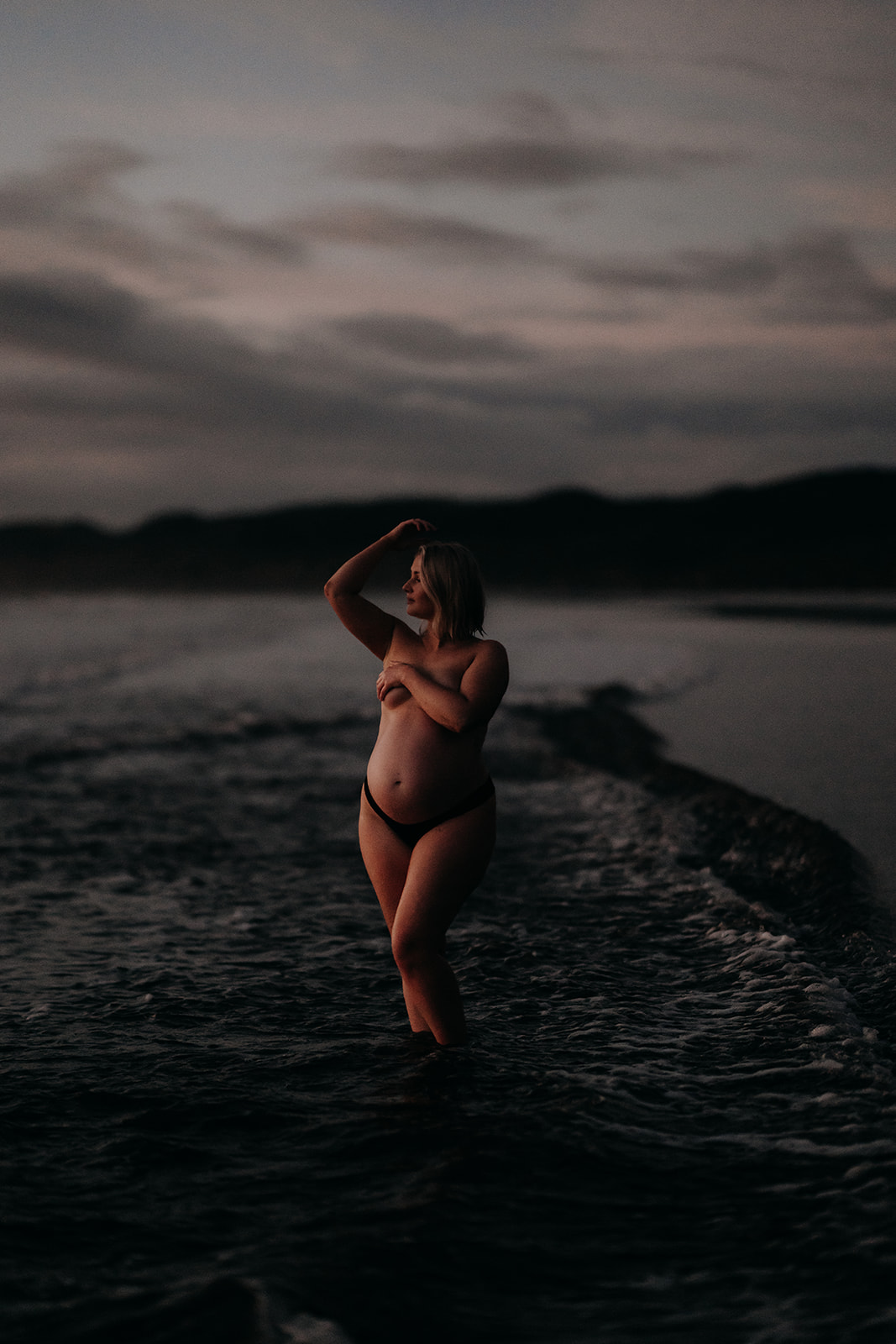 Maternity photograph of a woman during a raglan maternity photoshoot by waikato photographer haley adele photography
