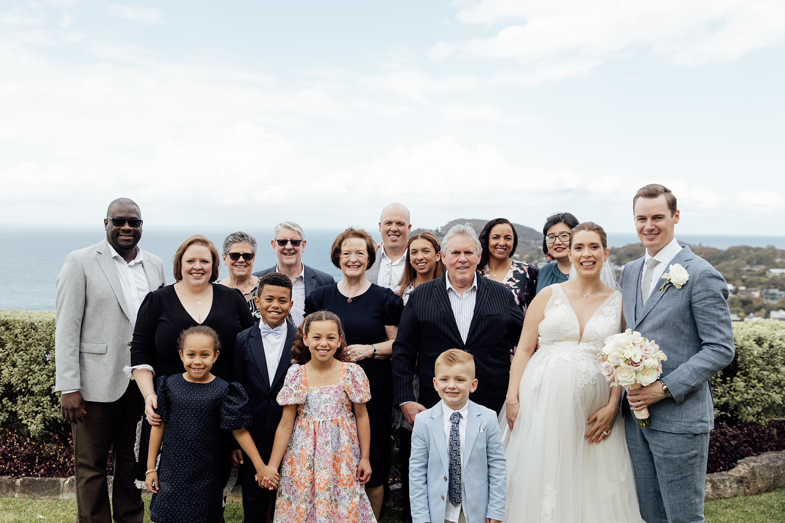 A family photo at a wedding