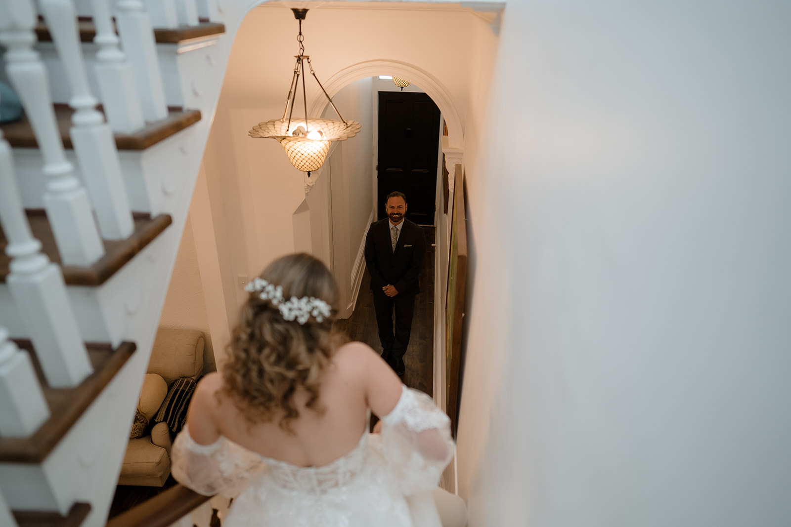 Bride showcases elegant wedding dress to tearful father before heading out to Montsalvat wedding venue
