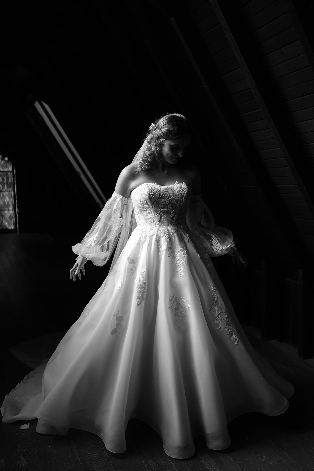 Bride twirls in her dress at Montsalvat's attic