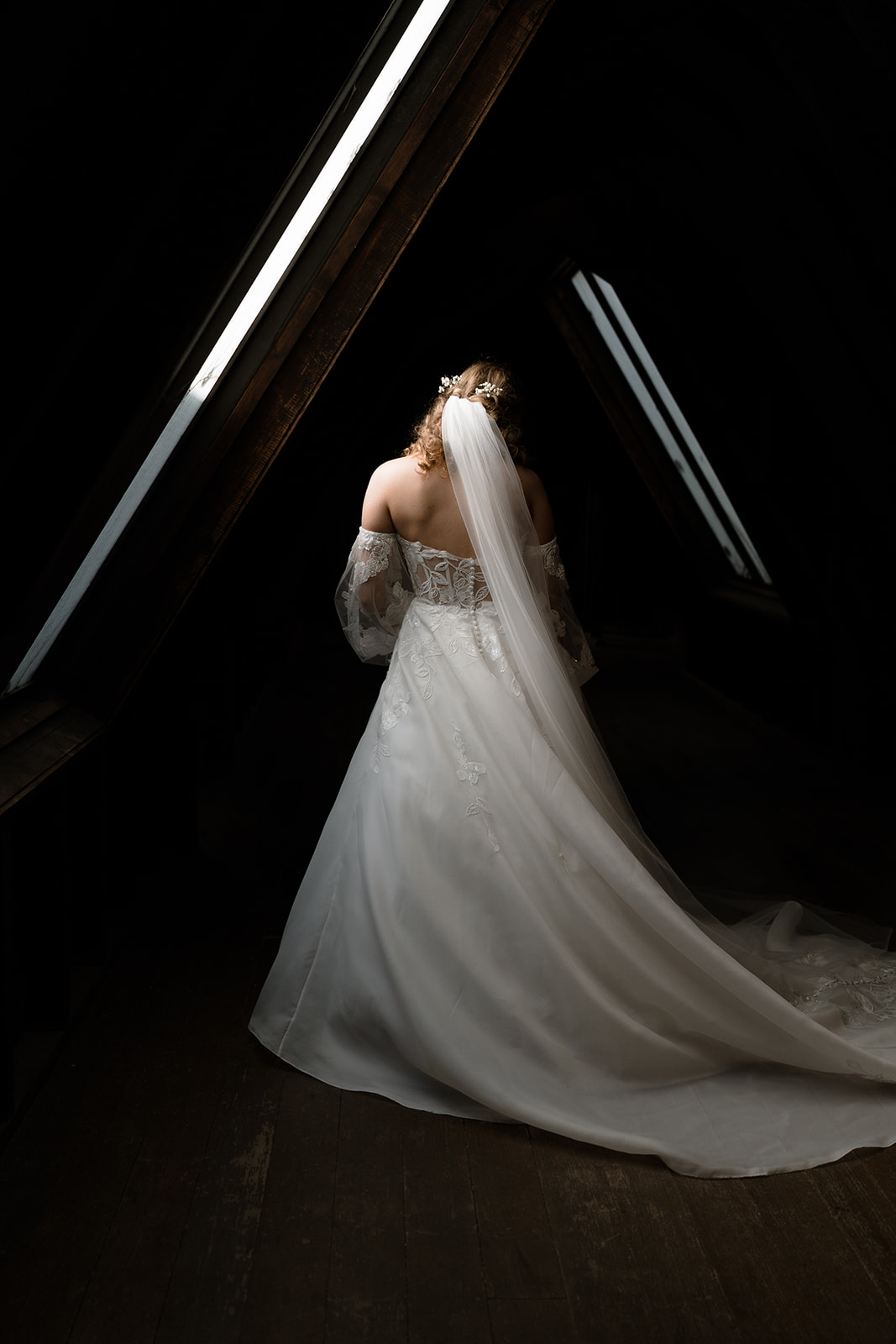 Montsalvat wedding photographer captures bride's stunning gown in soft light