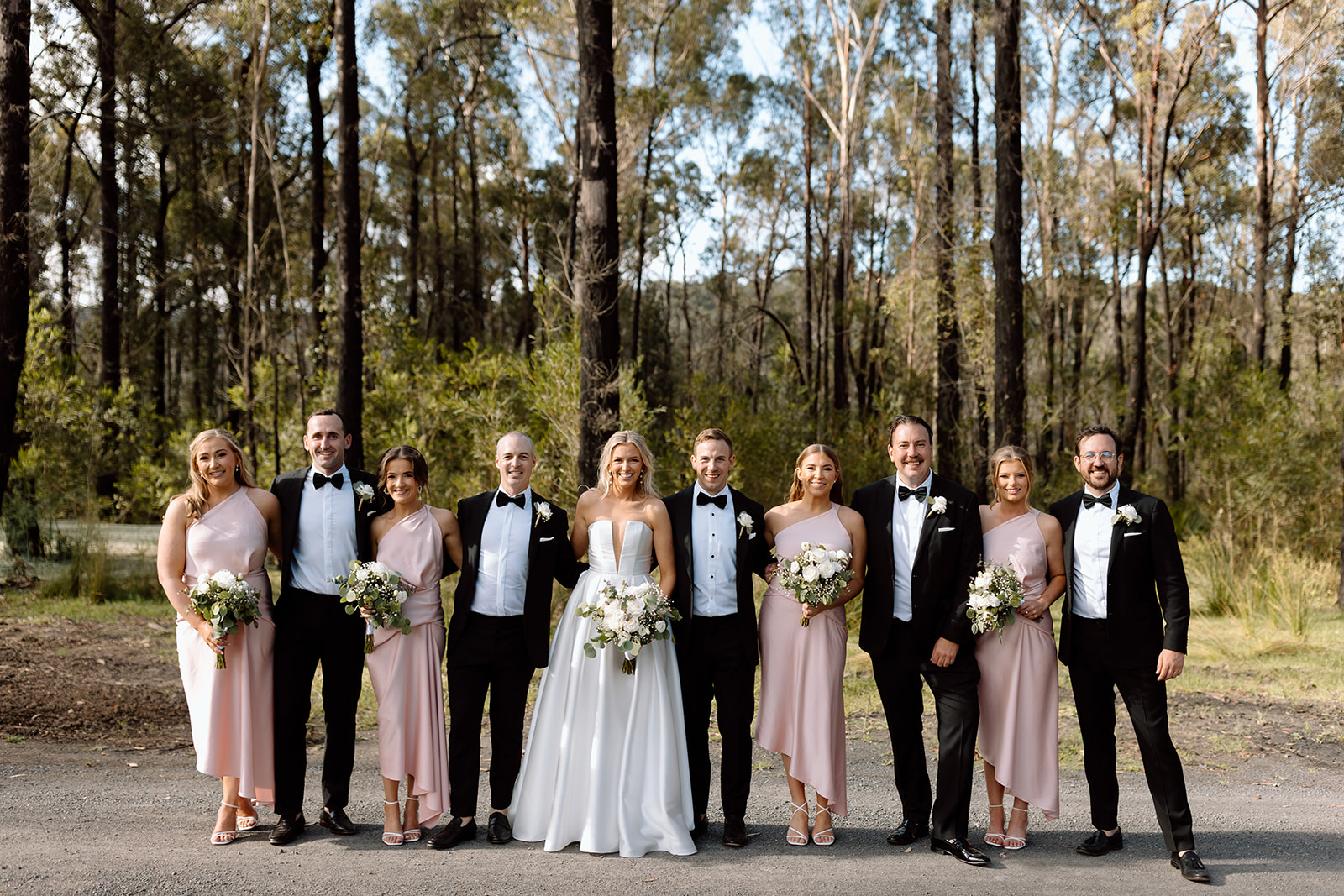 Couple with their bridal party at the wedding in the South Coast The Jackson Ranch