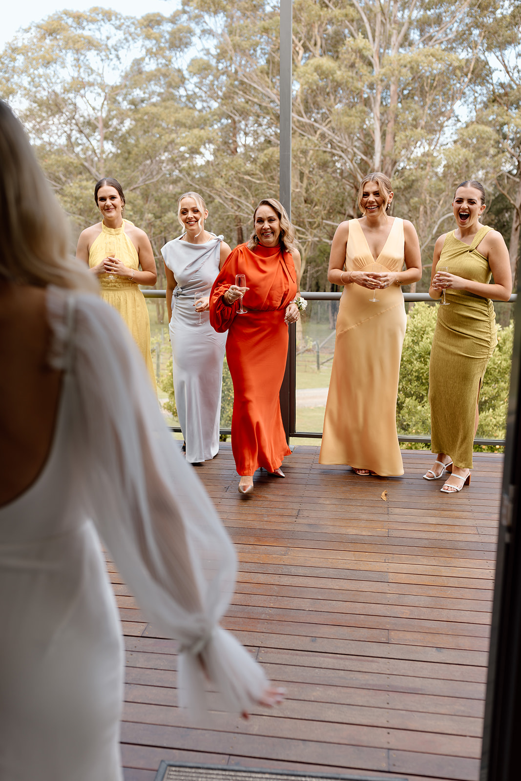 Bride first look with her mother and the bridesmaids at the wedding in the South Coast Bawley Vale Estate