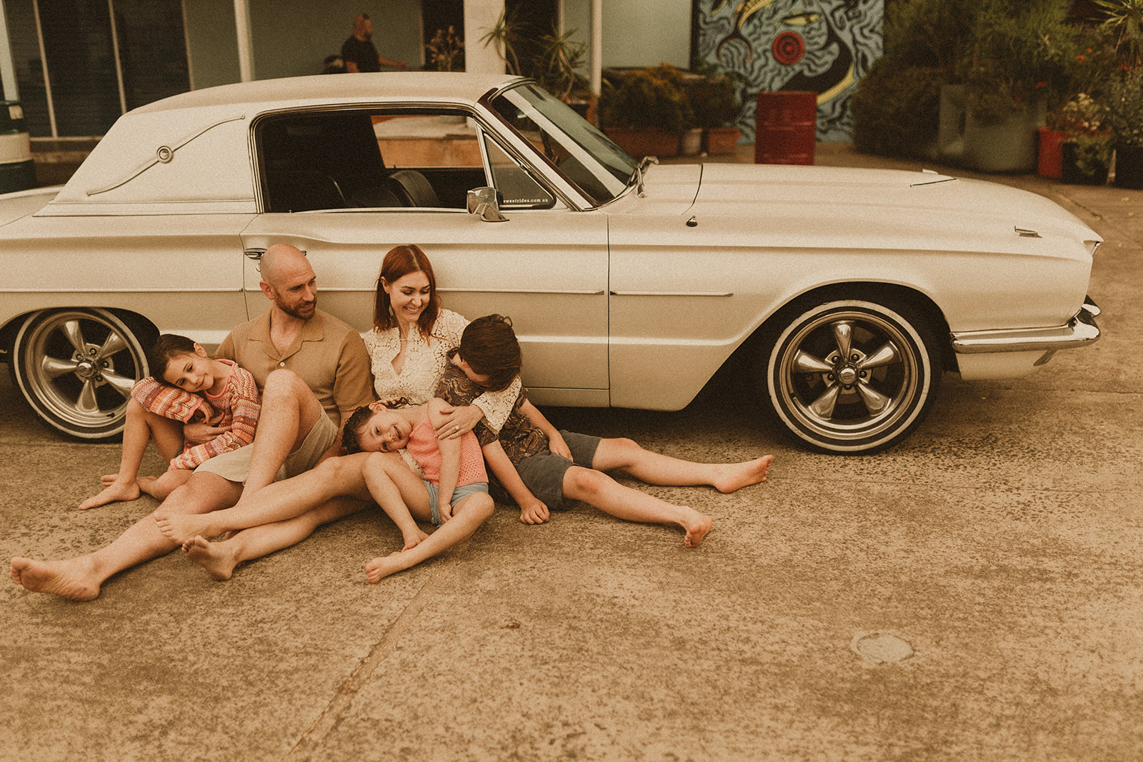 A Family who wanted a Family Photography shoot in Sydney with a retro car and a retro servo.