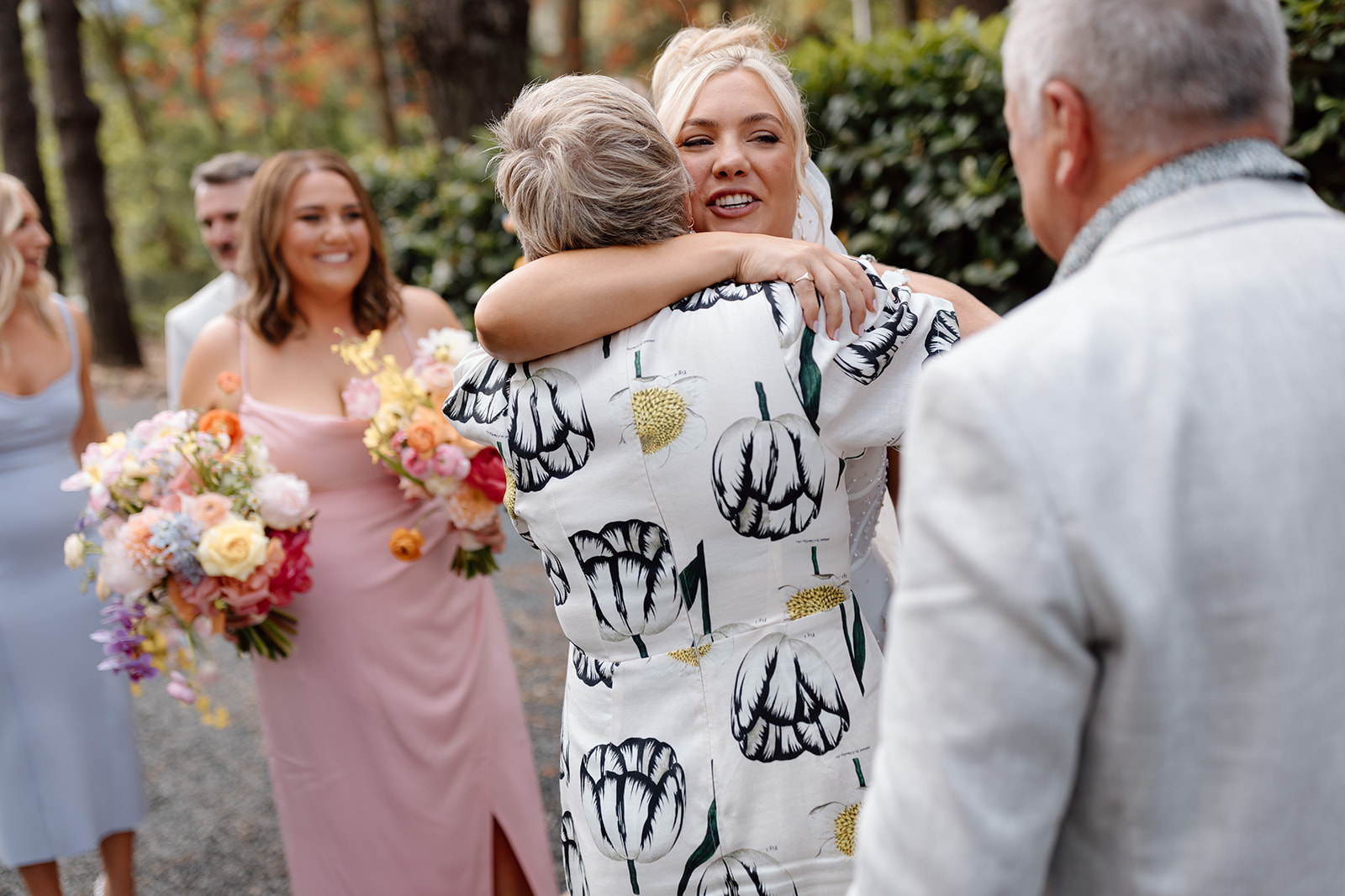 Hugs and kisses at the wedding in the South Coast The Lodge Jamberoo