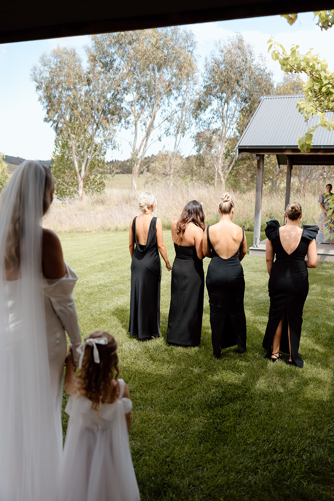 Bride first look with her bridesmaids at the wedding in the Southern Highlands Bendooley Estate