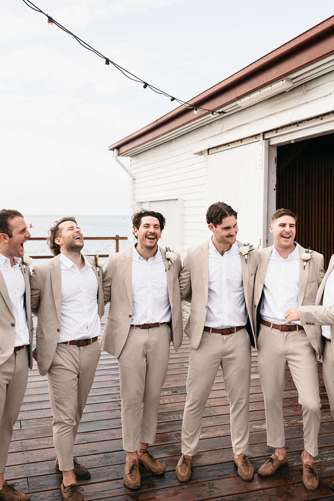 Groom and groomsmen in Port Douglas for wedding photos at the Sugar Wharf